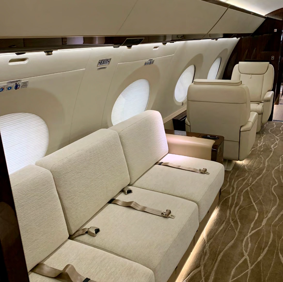 Mid-cabin divan and adjacent club seating
