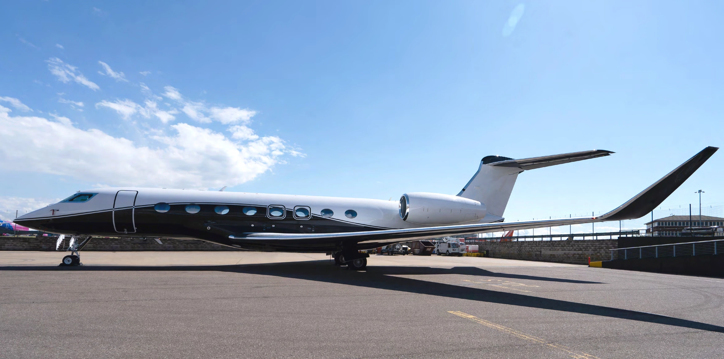 Gulfstream G650ER serial 6348 with a white upper fuselage and sweeping black lower paint scheme